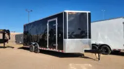 Black enclosed cargo trailer with door open.