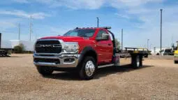 Red Ram tow truck with flatbed.