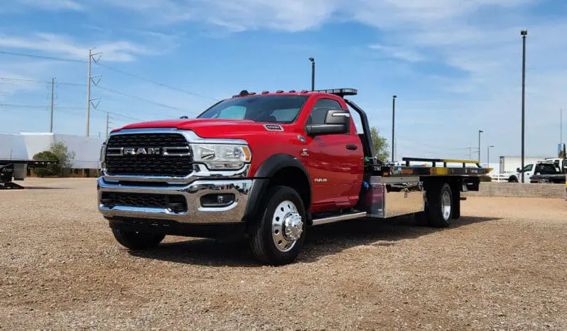 Red Ram tow truck with flatbed.