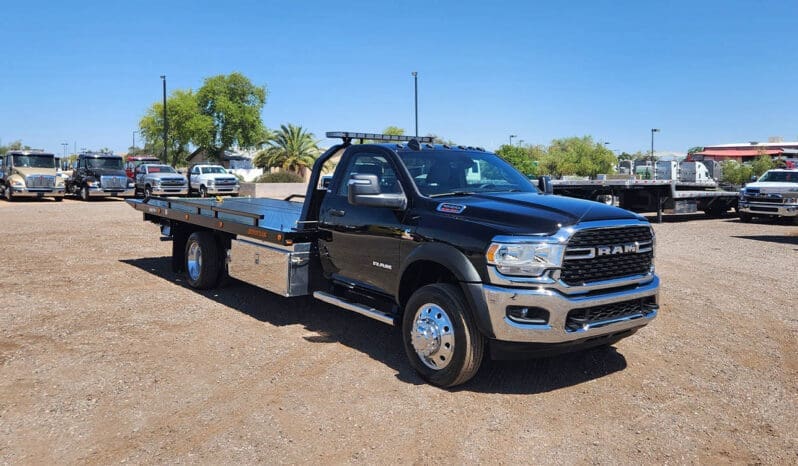 2024 RAM 5500 rollback tow truck for sale at Midco Sales.