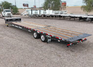 Landoll-930E-51-15-hydraulic-traveling-tail-trailer-for-sale-01-top-rear-angled-vew