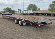 Landoll-930E-51-15-hydraulic-traveling-tail-trailer-for-sale-05-side-rear-angled-view