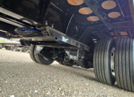 Landoll-930E-51-15-hydraulic-traveling-tail-trailer-for-sale-14-underside-trailer-axles-tires