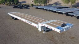 White XL Slider trailer with wooden deck.