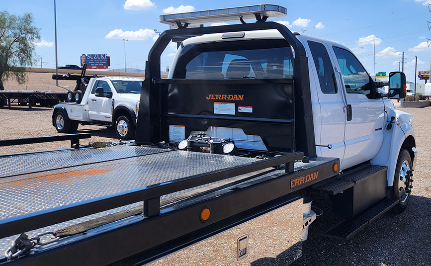 2023 Ford F650 used Jerrdan rollback tow truck - 16 - rear view of cab, headboard, lightbar, winch