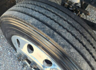 Ford F560 rollback tow truck for sale - Jerr-Dan - 14 - front tire