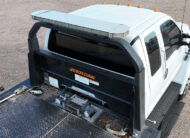 Ford F560 rollback tow truck for sale - Jerr-Dan - 15 - aerial view cab, lightbar, headboard, winch