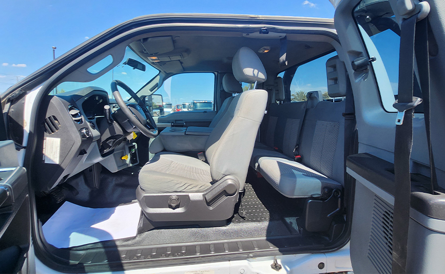 Ford F560 rollback tow truck for sale - Jerr-Dan - 20 - extended cab interior, doors open