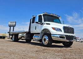 2025 international mv607 jerr-dan rollback tow truck - 01 - front view, passenger side