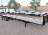 2026 dorsey steel giant flatbed trailer forklift kit - 03 - upper view, front, passenger side