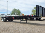2026 dorsey steel giant flatbed trailer forklift kit - 04 - low angle view, front, passenger side