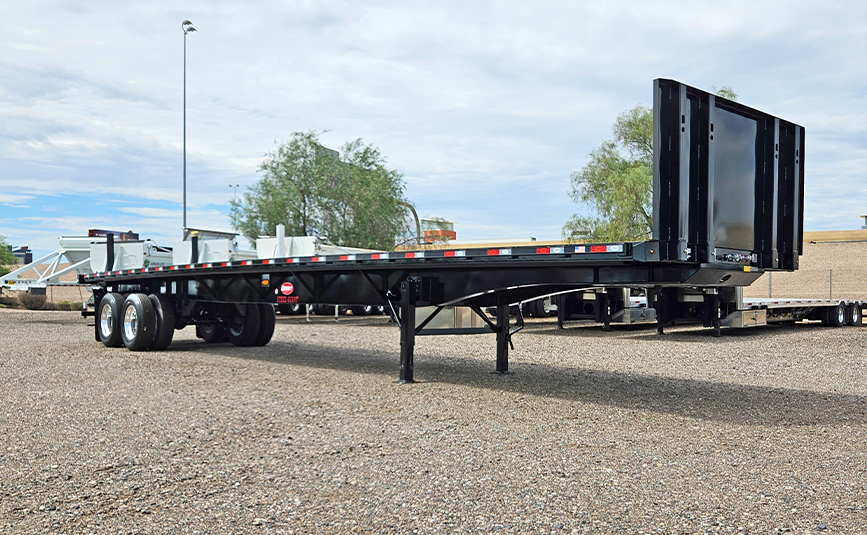 2026 dorsey steel giant flatbed trailer forklift kit - 04 - low angle view, front, passenger side