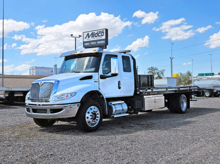 2022 used international mv607 jerr-dan rollltack tow truck - 01 - angled front, driver side view