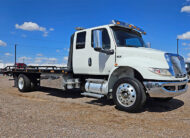 2022 used international mv607 jerr-dan rollltack tow truck - 02 - passenger side view
