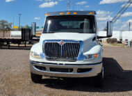 2022 used international mv607 jerr-dan rollltack tow truck - 03 - front view, grill, bumper