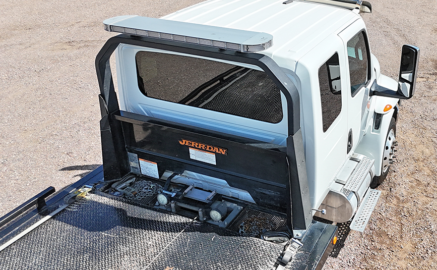 2022 used international mv607 jerr-dan rollltack tow truck - 14 - top view, cab, lightbar, headboard, winch