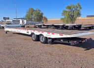 2026 landoll 930 traveling tail trailer - 05 - angled side and rear view