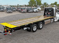 2027 peterbilt 567 jerr-dan industrial carrier transporter tow truck - 07 - passenger side, rear view