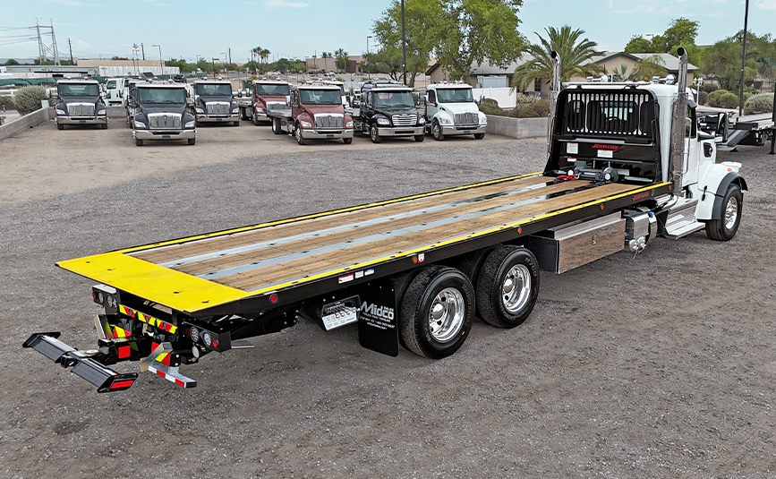 2027 peterbilt 567 jerr-dan industrial carrier transporter tow truck - 07 - passenger side, rear view