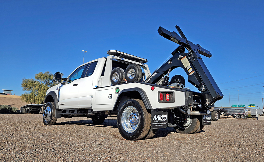2026 ford F450 Jerr-Dan repo tow truck - 04 - driver side rear angle view, low angle