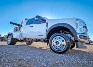 2026 ford F450 Jerr-Dan repo tow truck - 05 - passenger side, low angle