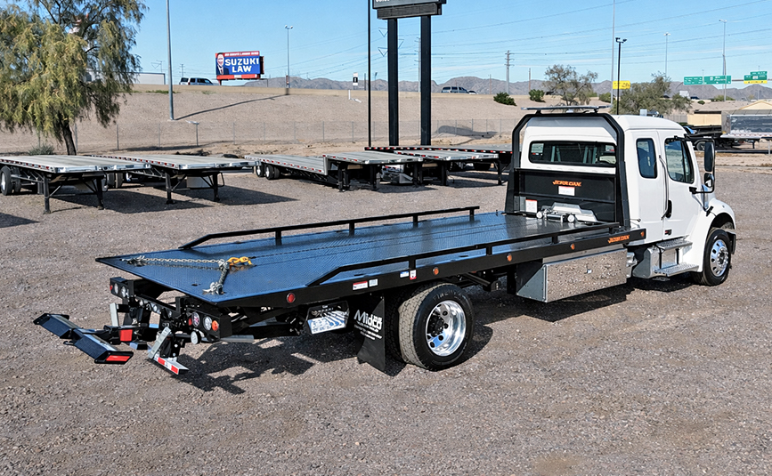 2026 freightliner m2 jerr-dan rollback tow truck - 04 - angled rear side view, rollback flatbed, wheel lift