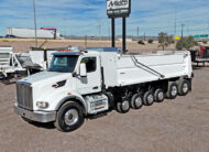 2022 peterbilt 567 simple 18 dump truck - 01 - driver side view