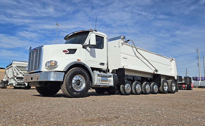 2022 peterbilt 567 simple 18 dump truck - 02 - driver side view
