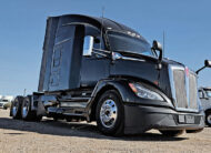 2022 kenworth T680 black sleeper cab truck - 03 - passenger side
