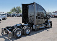 2022 kenworth T680 black sleeper cab truck - 04 - passenger side, rear frame, wheels, tires