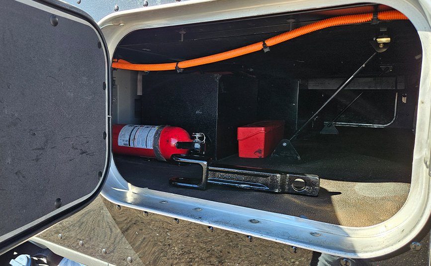 2022 kenworth T680 black sleeper cab truck - 11 - tunnel storage toolbox