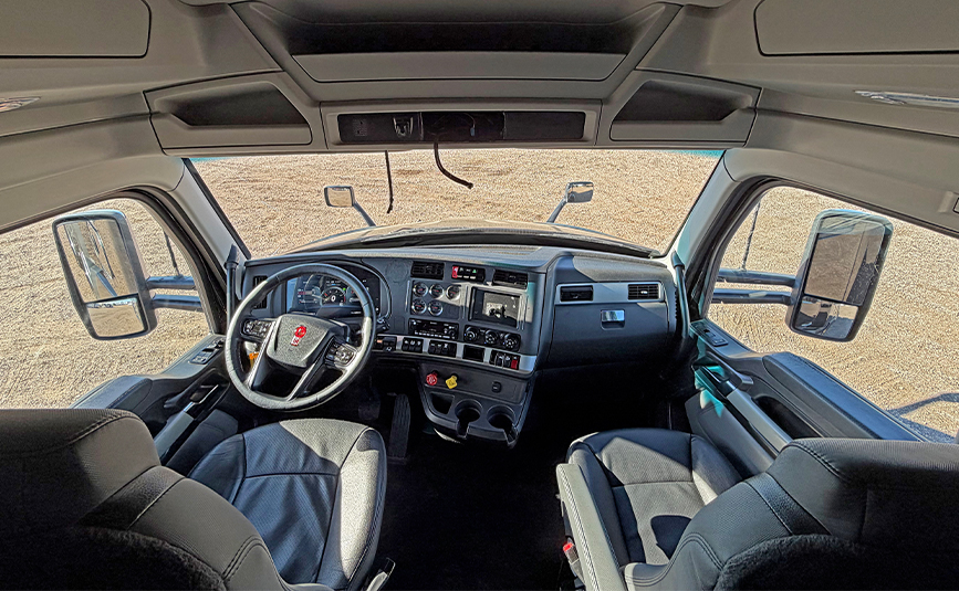 2022 kenworth T680 black sleeper cab truck - 21 - cab interior
