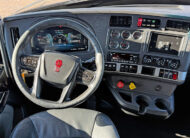 2022 kenworth T680 black sleeper cab truck - 22 - dashboard, steering wheel