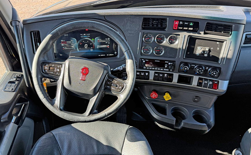 2022 kenworth T680 black sleeper cab truck - 22 - dashboard, steering wheel