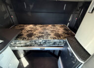 2022 kenworth T680 black sleeper cab truck - 26 - sleeper cab rear matress bunk