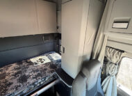 2022 kenworth T680 black sleeper cab truck - 27 - sleeper cab