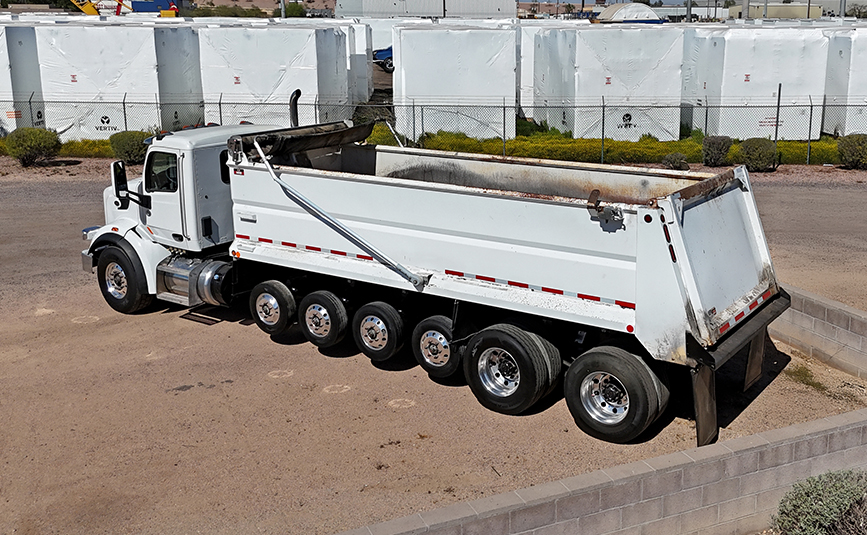 2022 peterbilt simple 18 dump truck - 03 - side rear angled view