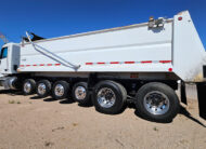 2022 peterbilt simple 18 dump truck - 03 - side rear angled view