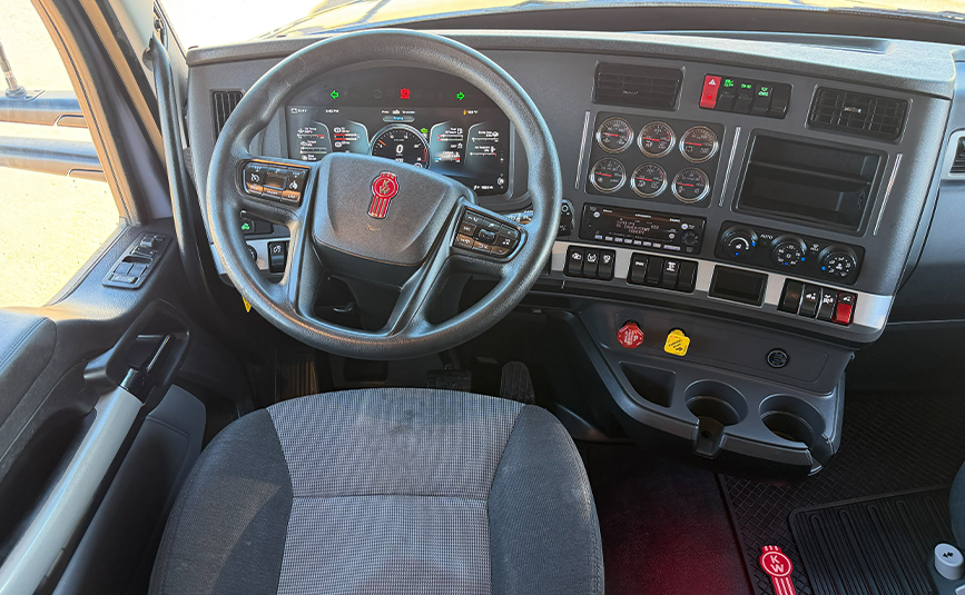 2023 kenworth T680 sleeper cab used truck - 16 - interior, dashboard, steering wheel, driver seat