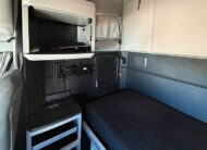 2023 kenworth T680 sleeper cab used truck - 20 - sleeper cab storage, bunk