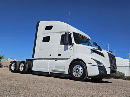 2025 volvo VNL64T760 sleeper cab truck - 01 - passenger side view