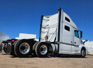 2025 volvo VNL64T760 sleeper cab truck - 02 - passenger side rear angle, wheels tires