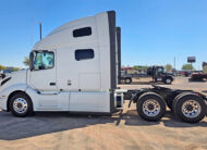 2025 volvo VNL64T760 sleeper cab truck - 04 - driver side view