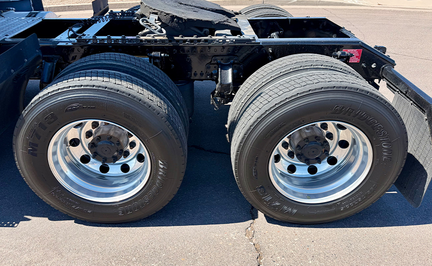 2025 volvo VNL64T760 sleeper cab truck - 10 - driver side tires and wheels