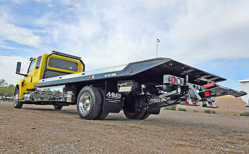 2027 international mv607 jerr-dan rollback yellow tow truck - 05 - rear, driver side, tires, wheel lift