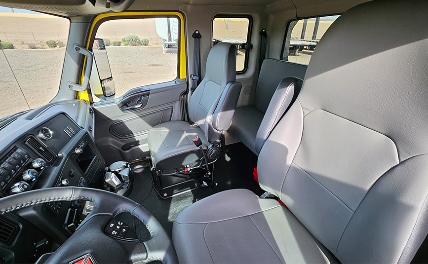 2027 international mv607 jerr-dan rollback yellow tow truck - 27 - cab interior, seats