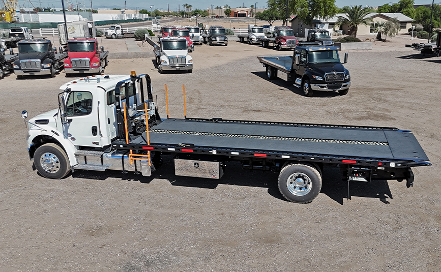 Freightliner Landoll Loadoll II rollback carrier - 05 - driver side, aerial view, loadoll deck